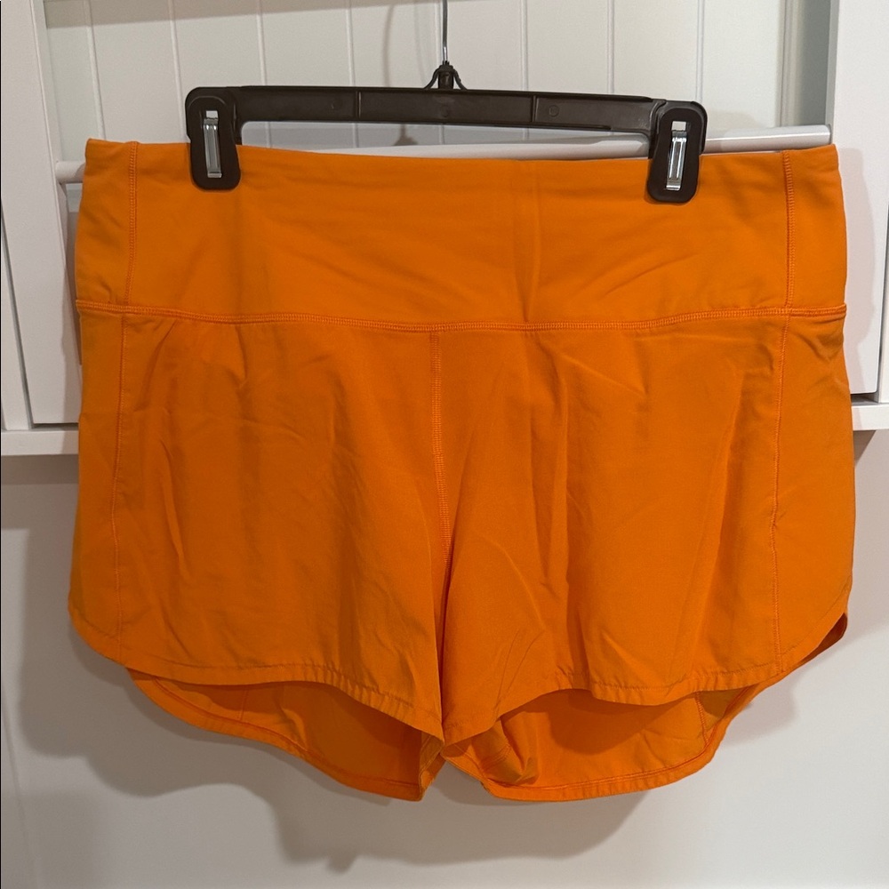 lululemon athletica Orange Athletic Shorts with Built-In Brief- 4” inseem